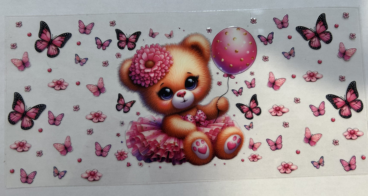 Bear in tutu with butterflies