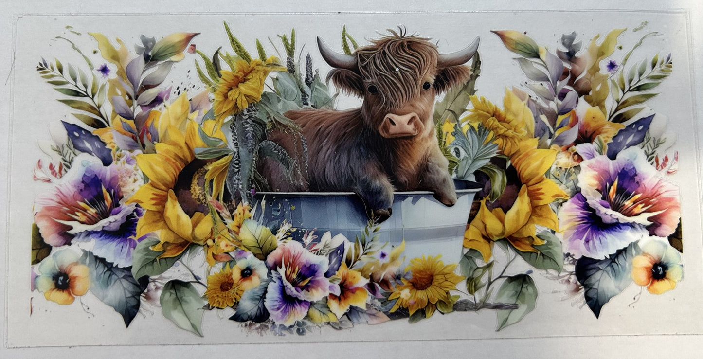 Cow in bucket with flowers