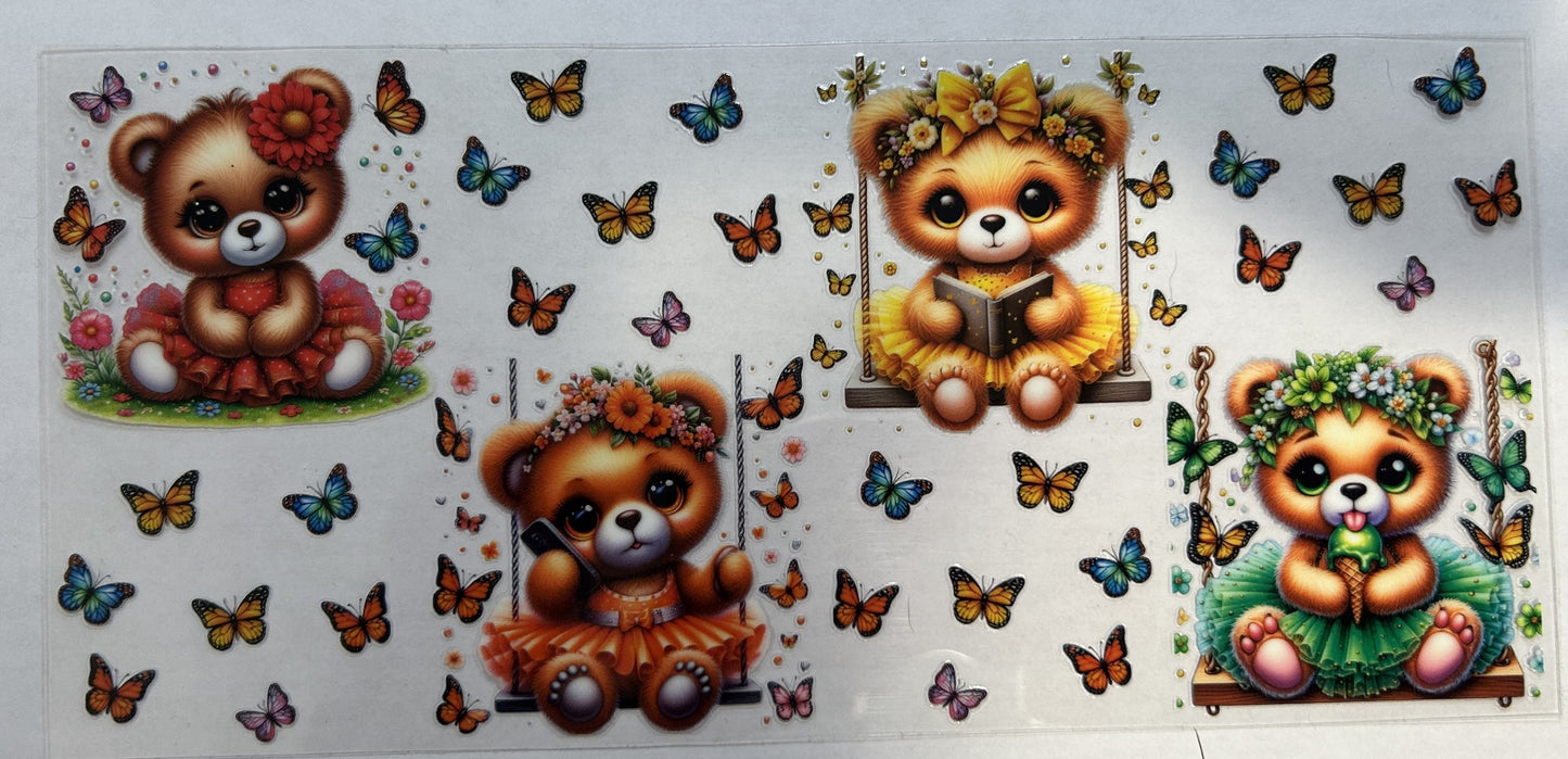 Cute little bears in tutus with butterflies