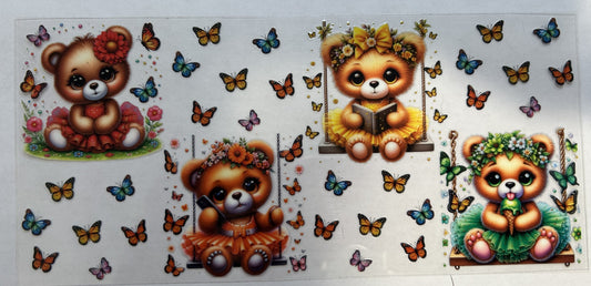 Cute little bears in tutus with butterflies