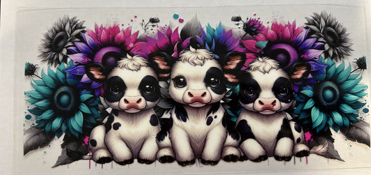 Vibrant colored flowers and cows