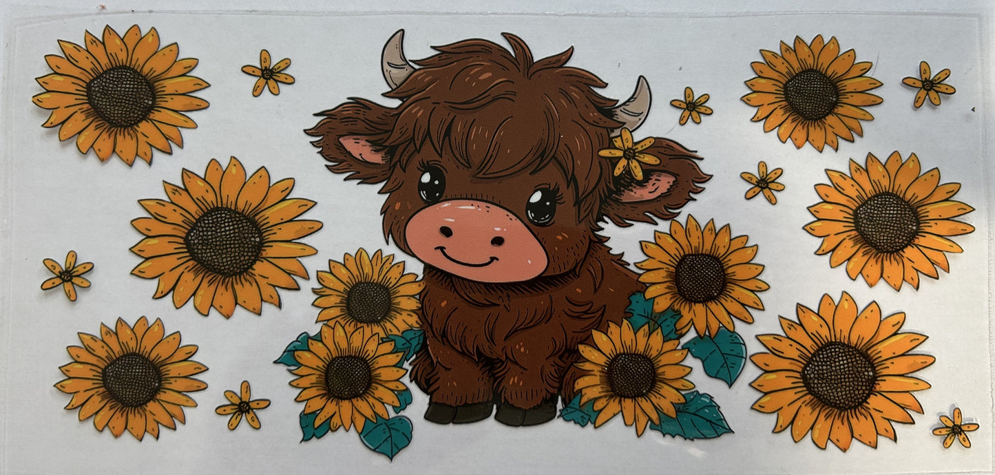 Cow and sunflowers