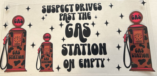 Suspect drives past the gas station